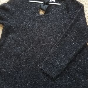 Jennifer Lopez black shimmery sweater